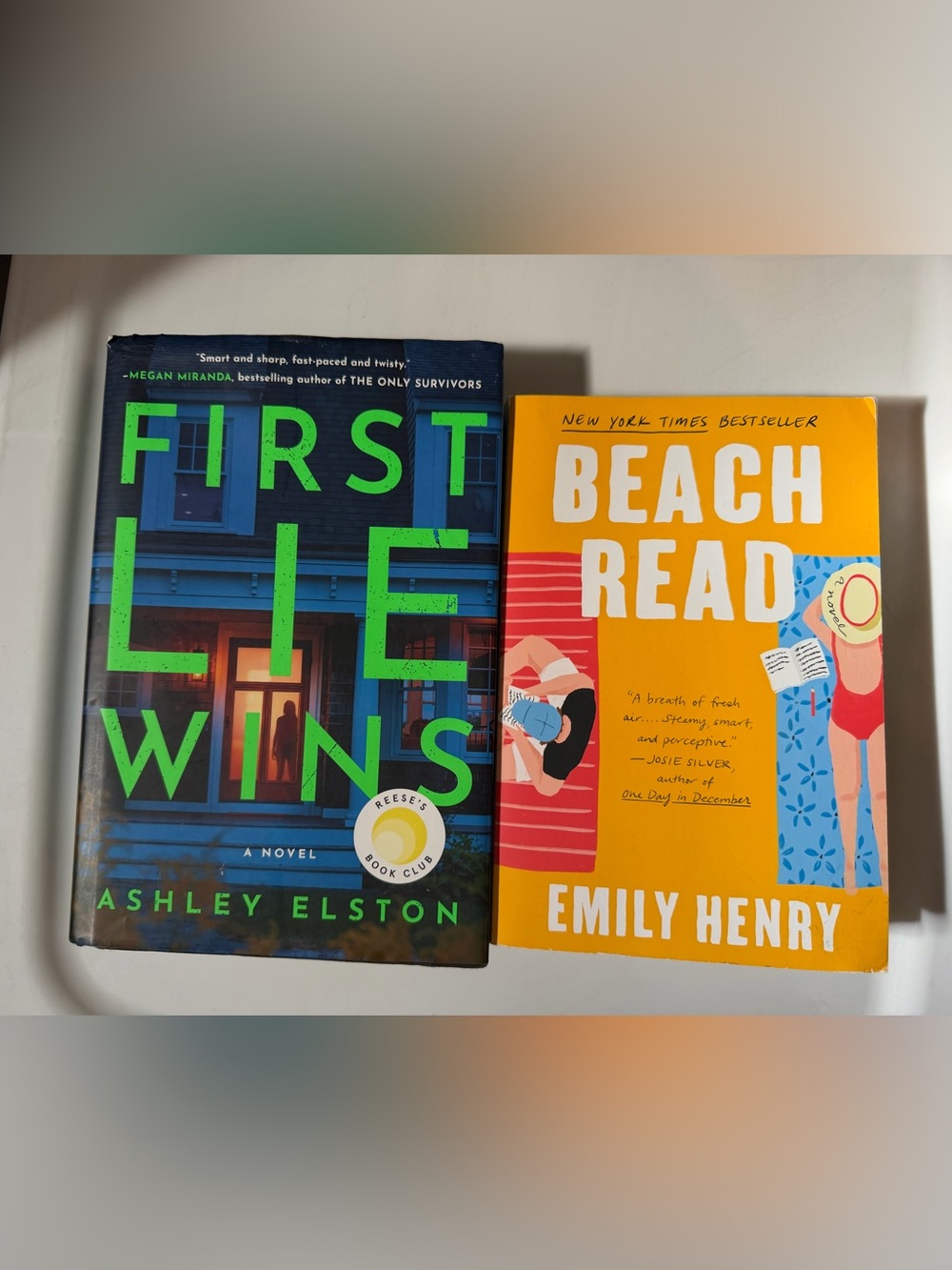 First Lie Wins by Ashley Elston Hardcover & Beach Read by Emily Henry.